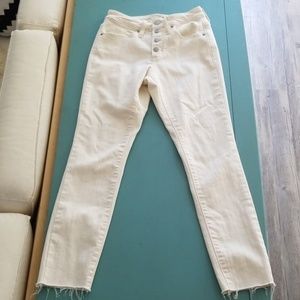 Universal thread button front raw hem white jeans